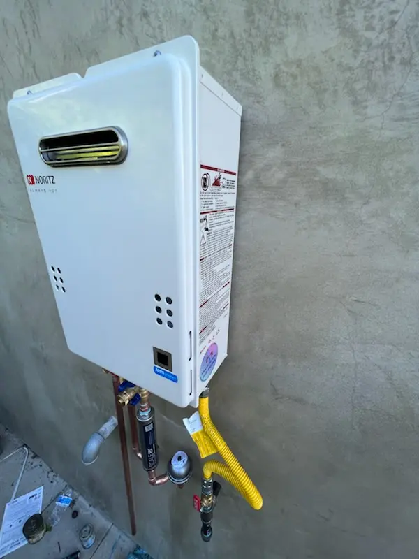 Tankless water heater installation for Hygiene homes
